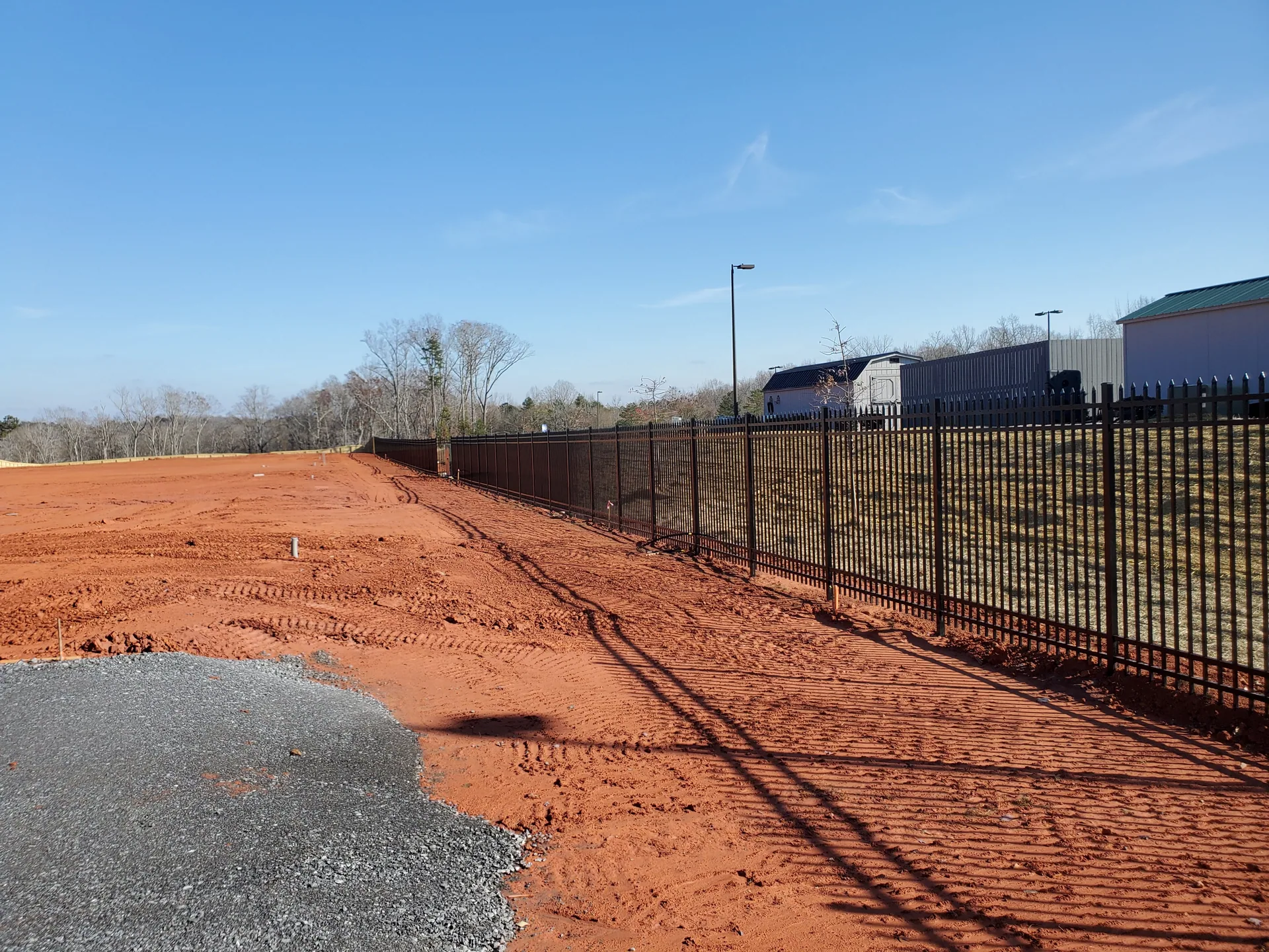 Black aluminum picket fence red clay site gastonia