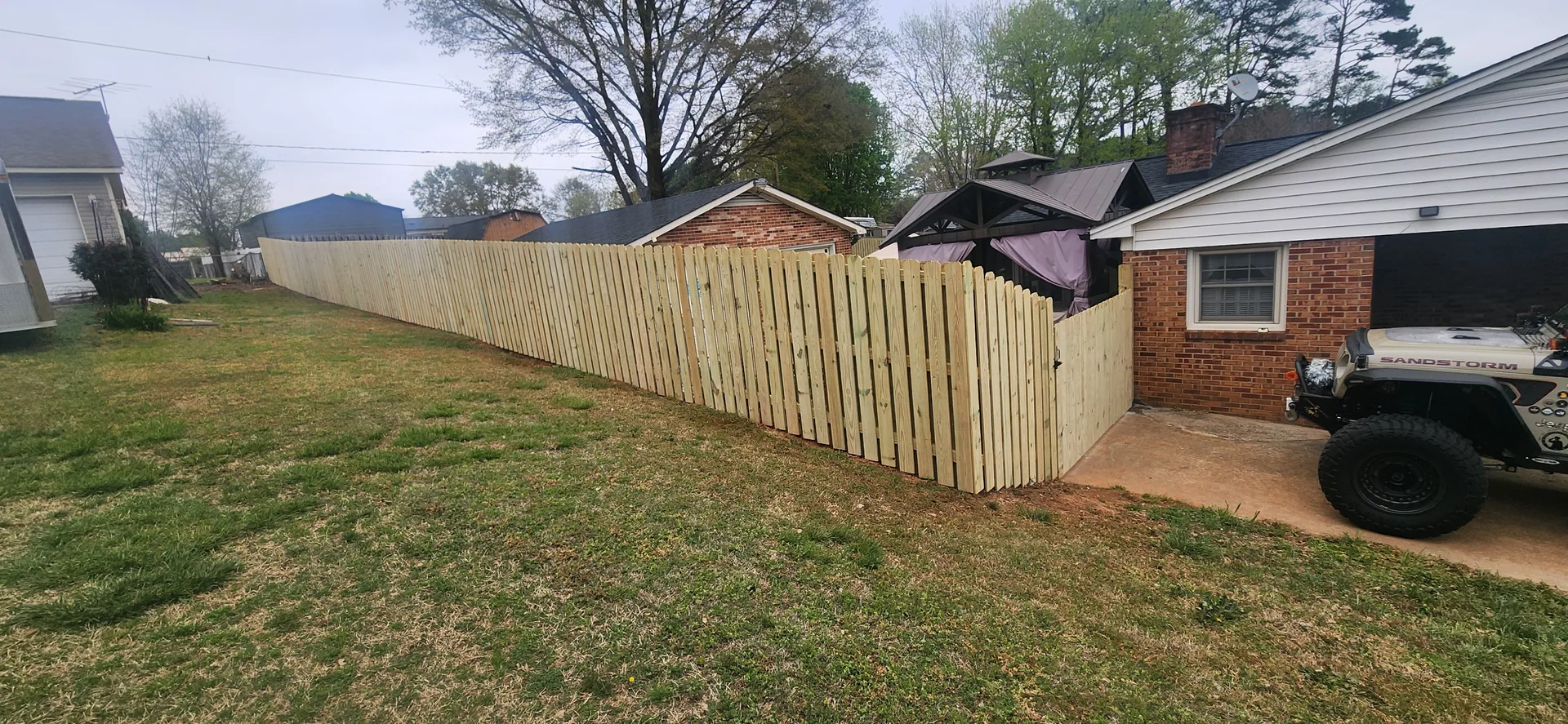 New wood shadowbox fence side yard gate brick ranch jeep gastonia nc