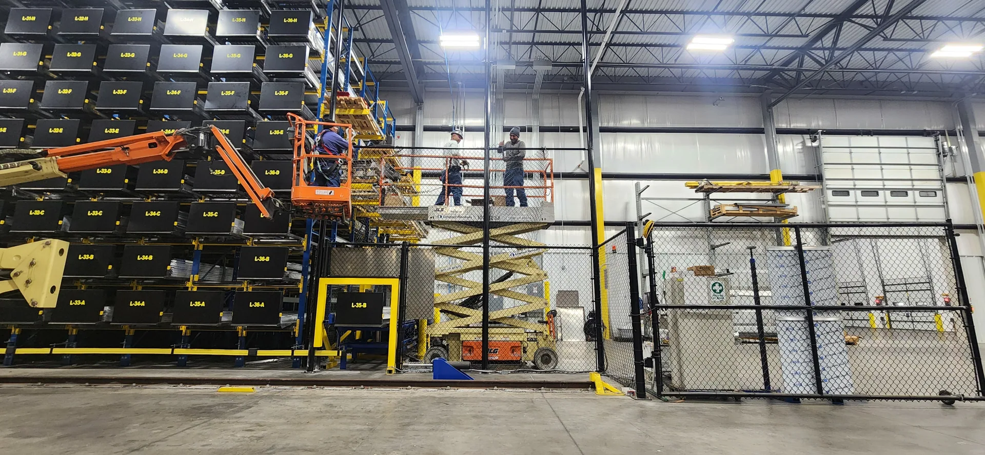 Scissor lift boom lift warehouse racking chain link gastonia